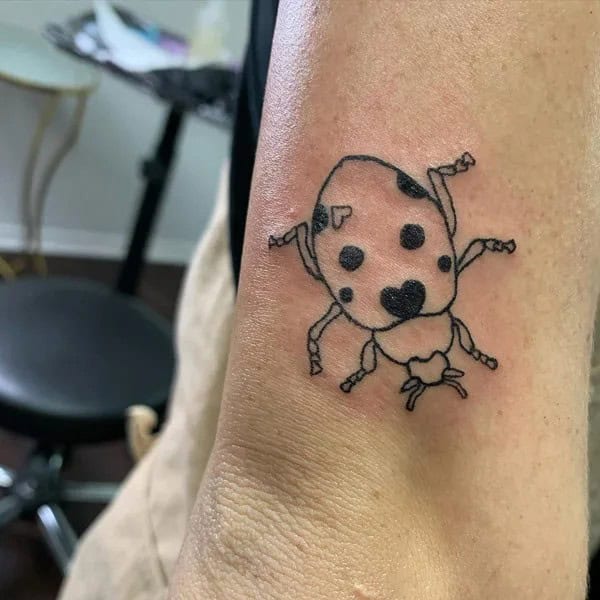 Ladybug Outline Tattoo