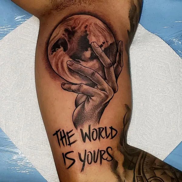 “The World Is Yours” Finger Tattoo