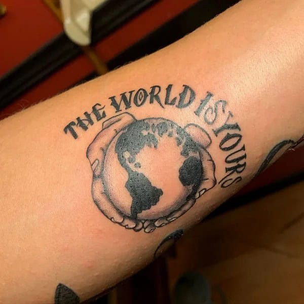 “The World Is Yours” Finger Tattoo