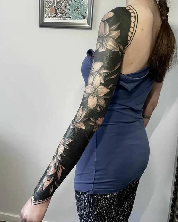 Blackwork Flower Sleeve Tattoo