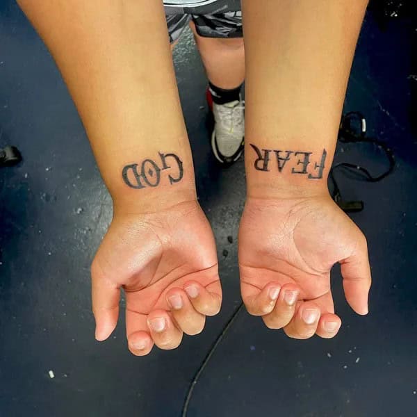 Fear God Tattoo on Wrist