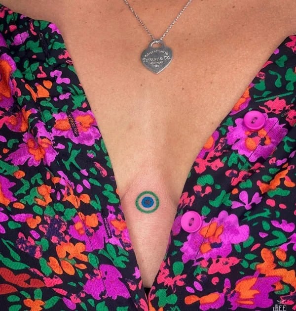 Evil Eye Sternum Tattoo