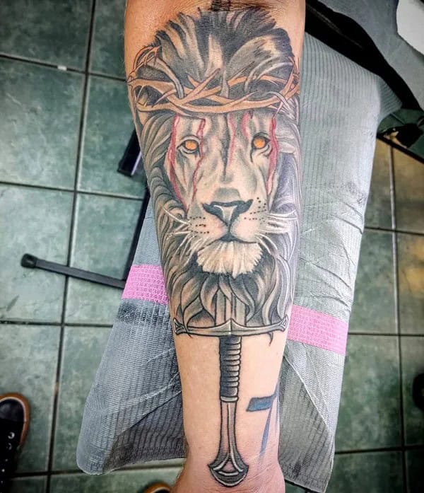 Lion with Crown of Thorns Tattoo