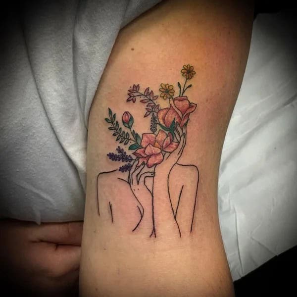 Female Bicep Tattoo