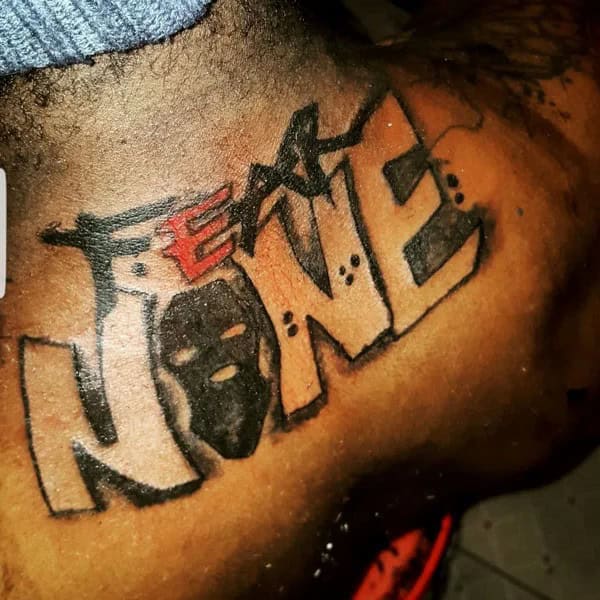 Fear None Skull Tattoo