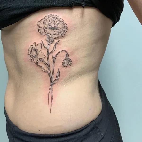 January Birth Flower Rib Tattoo