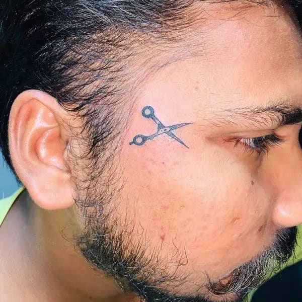 Scissor Face Tattoo