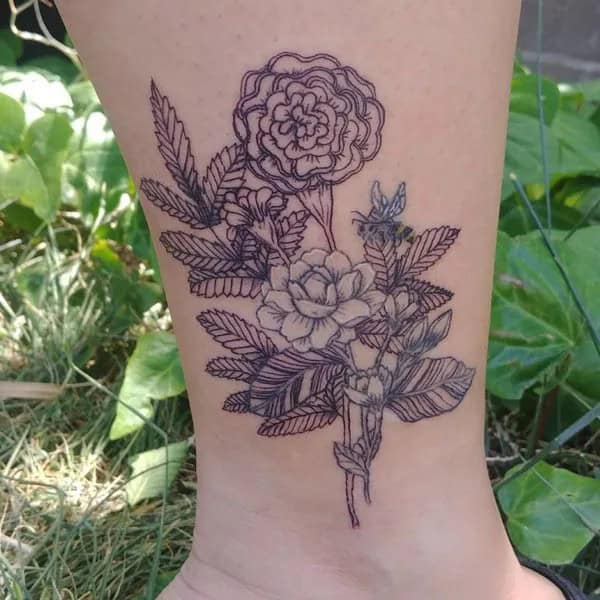 Black and White Marigold Tattoo