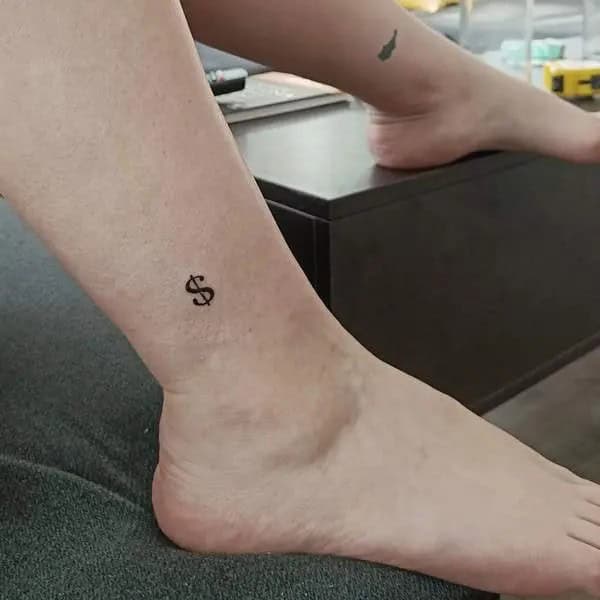 Small Dollar Sign Tattoo