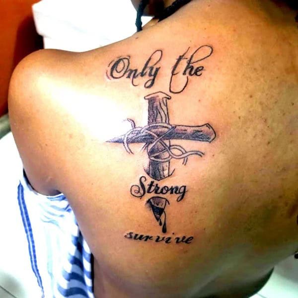 “Only The Strong Survive” Tattoo with a Cross