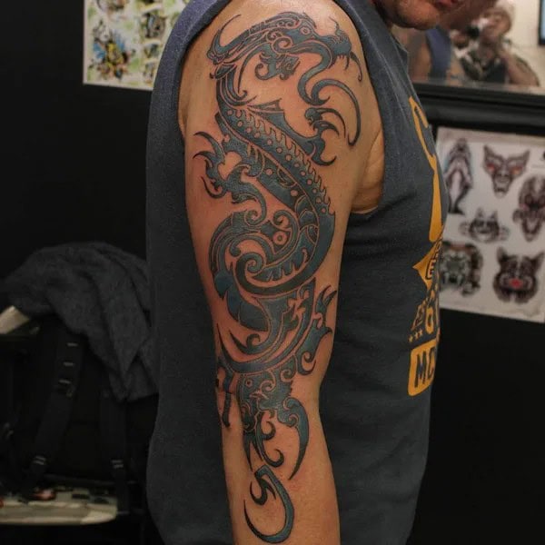 Tribal Dragon Sleeve Tattoo