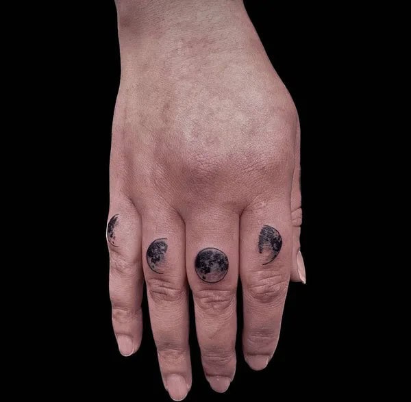 Moon Phase Finger Tattoo