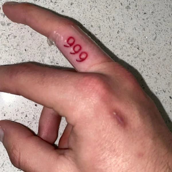 999 Tattoo on Finger