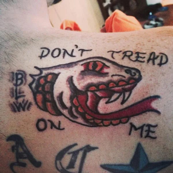 “Don’t Tread On Me” Back Tattoo