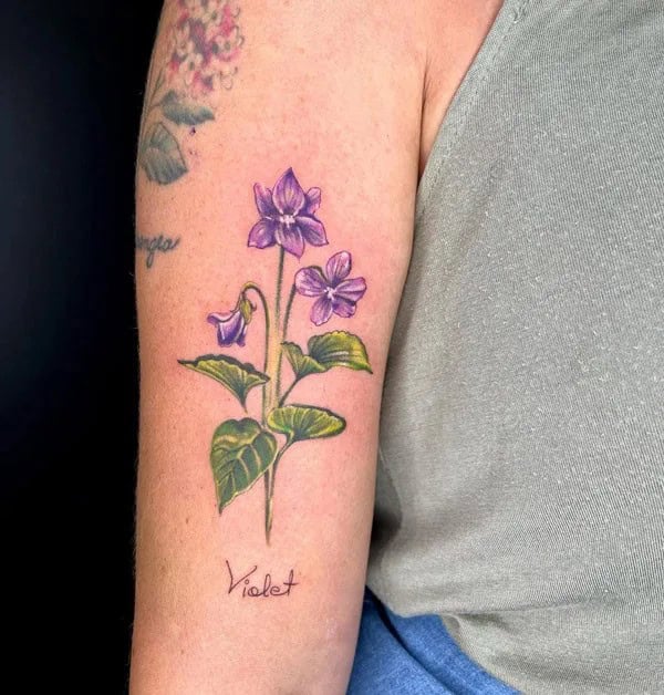 Violet Tattoo on The Arm