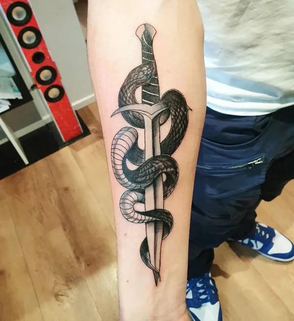 Snake Wrapped Around Sword Tattoo