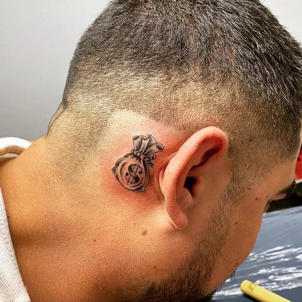 Behind The Ear Money Bag Tattoo