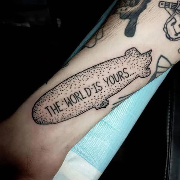 “The World Is Yours” Finger Tattoo