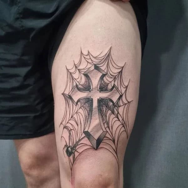 Cross Thigh Tattoo