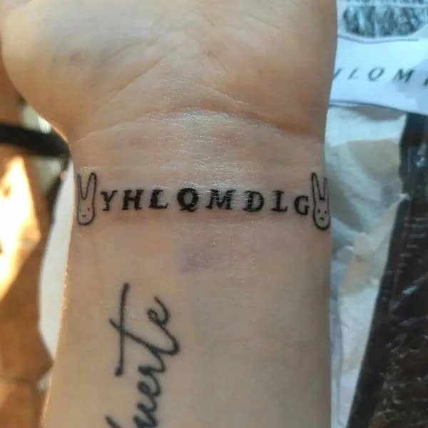 “YHLQMDLG” Wrist Tattoo