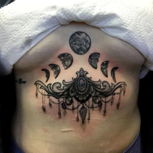 Moon Phases Tattoo Under Breast