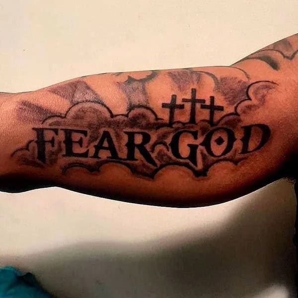 Fear God Tattoo on Bicep