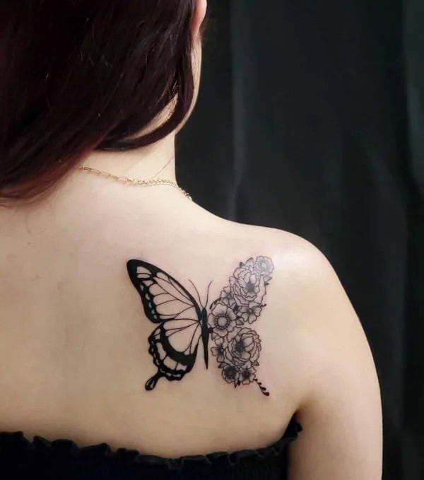 Half butterfly half flower forearm tattoo