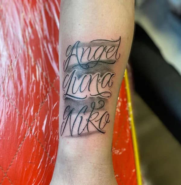 Forearm Name Tattoo