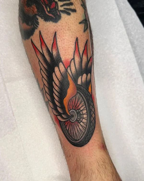 Motorcycle Wheel With Wings Tattoo