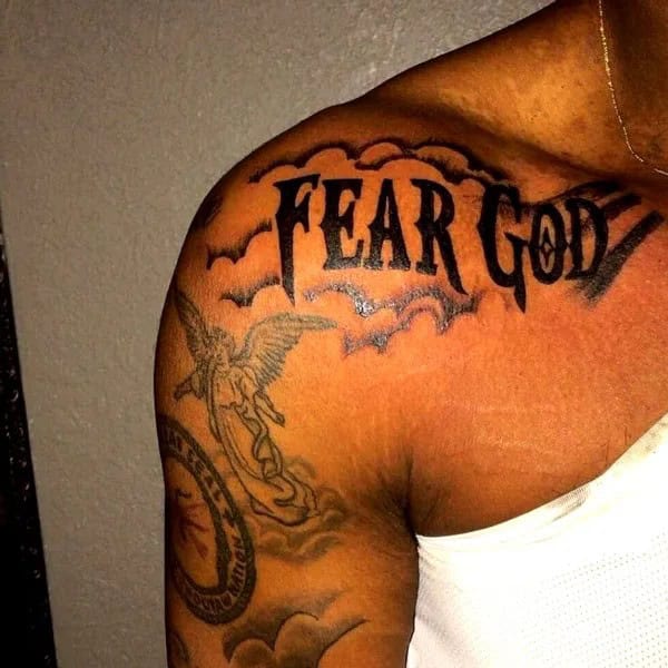 Fear God Tattoo on Shoulder