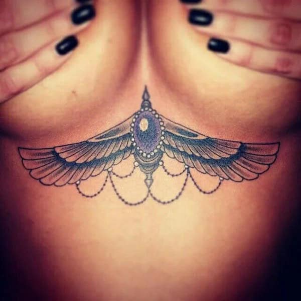 Wings Under Breast Tattoo