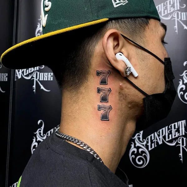 Behind the ear 777 Tattoo