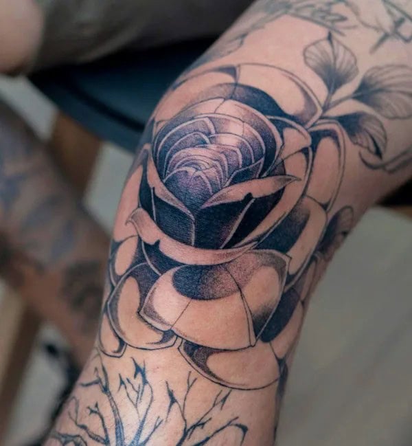 Black Rose Tattoo on the Knees