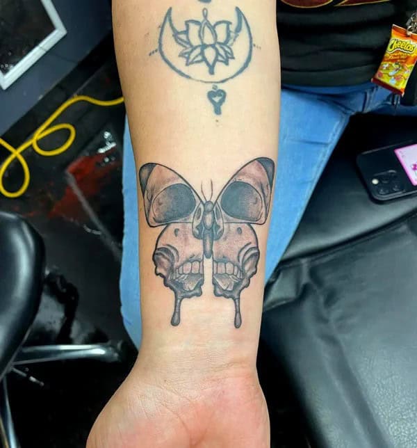 Butterfly Skull Wrist Tattoo