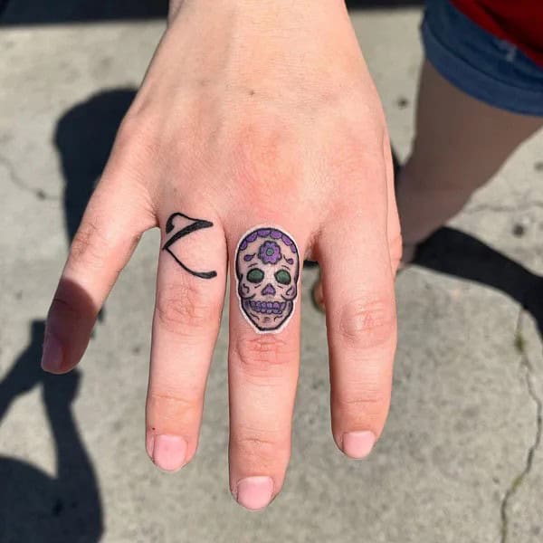 Sugar Skull Finger Tattoo