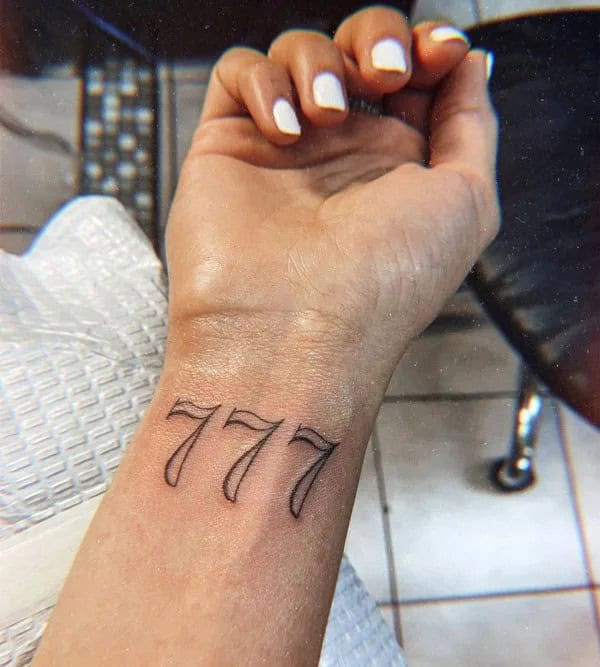 777 Wrist Tattoo