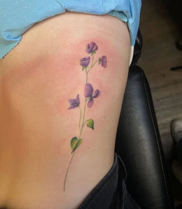 February Birth Flower Ribs Tattoo