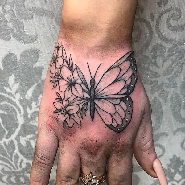 Half Butterfly, Half Flower Hand Tattoo