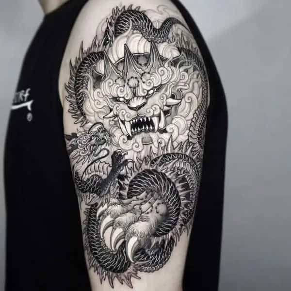 Foo Dog Arm Tattoo