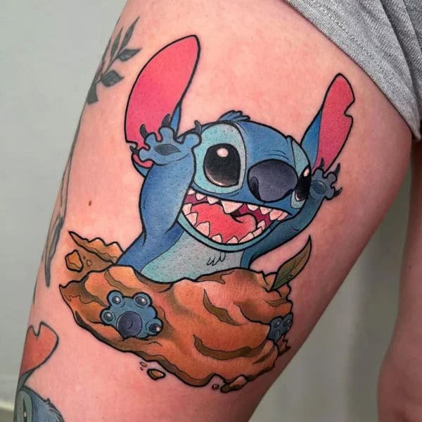 Stitch Thigh Tattoo