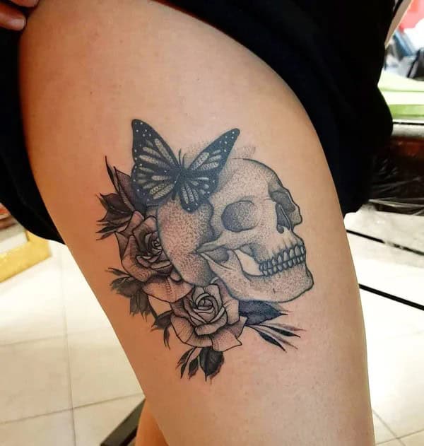 Butterfly Skull Thigh Tattoo