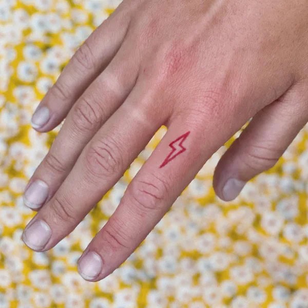 Lightning Bolt Finger Tattoo