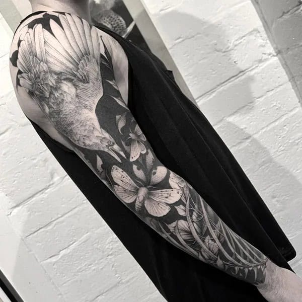 Negative Space Sleeve Tattoo