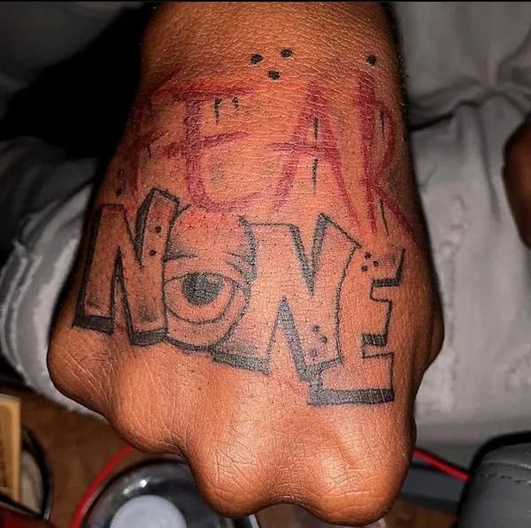 Fear None Skull Tattoo