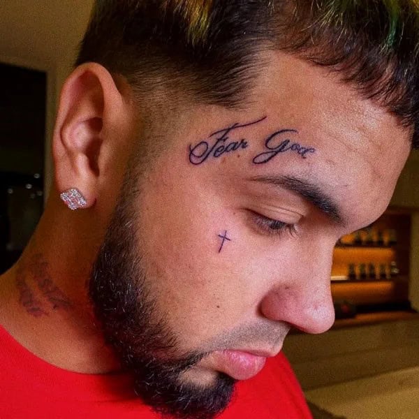 Fear God Tattoo on Forehead