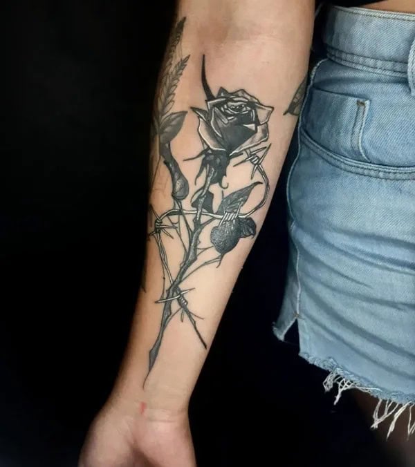 Black Rose Tattoo on the Forearm