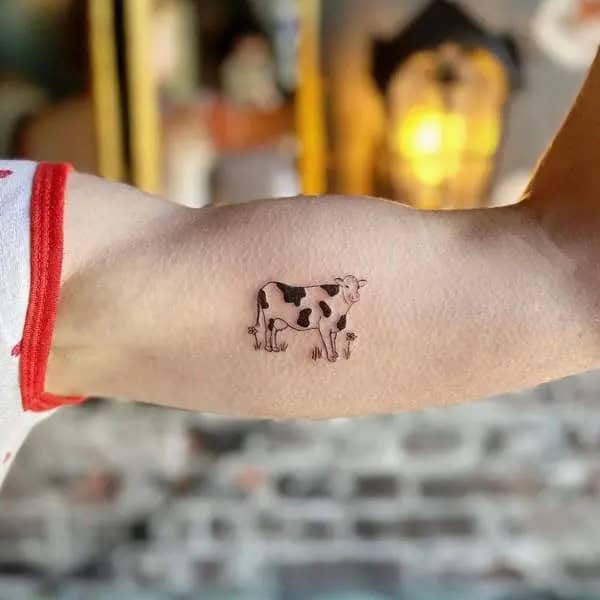 Small Cow Tattoo