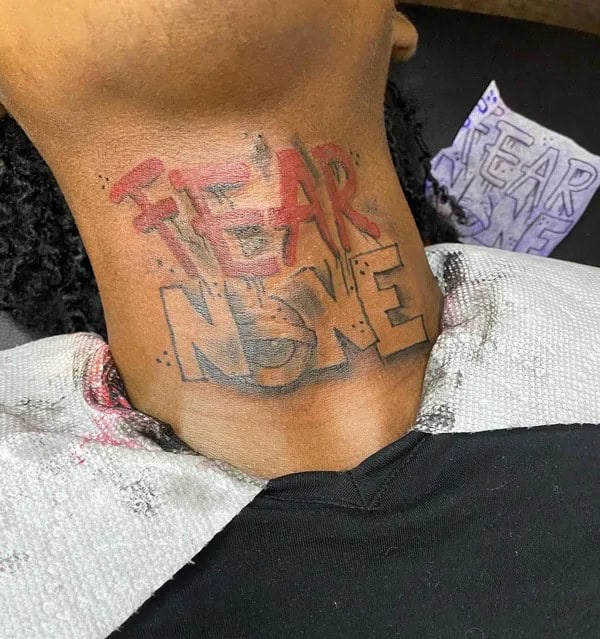 Fear None Throat Tattoo