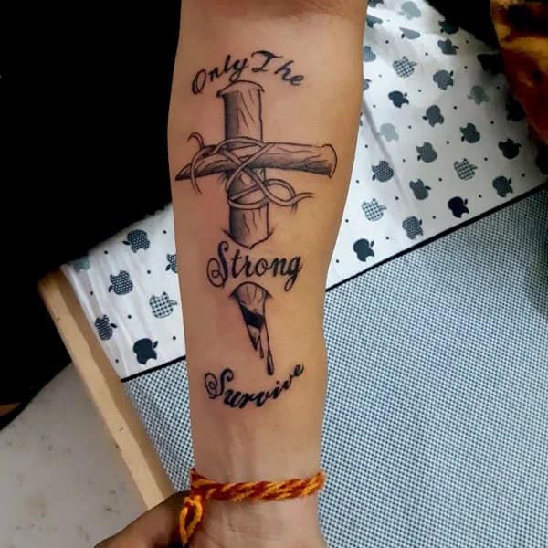 “Only The Strong Survive” Tattoo with a Cross