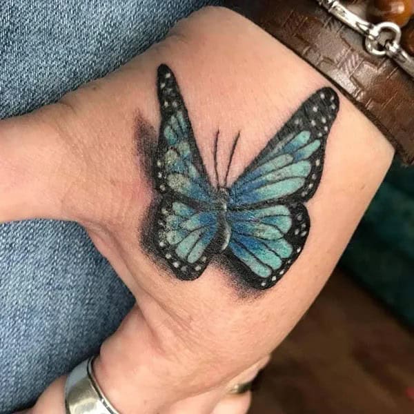 Semicolon Butterfly Hand Tattoo